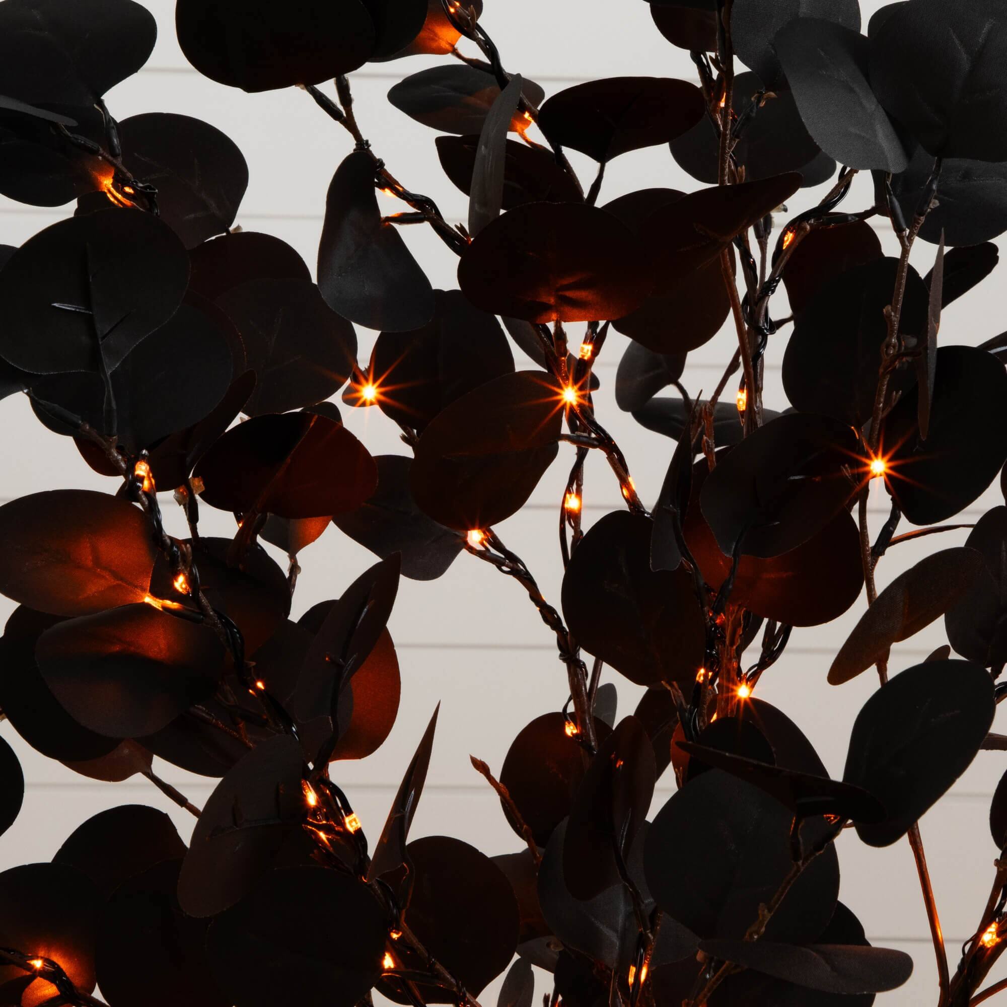 4ft. Pre-Lit Artificial Halloween Black Eucalyptus Tree with 160 Orange & Purple LED Lights